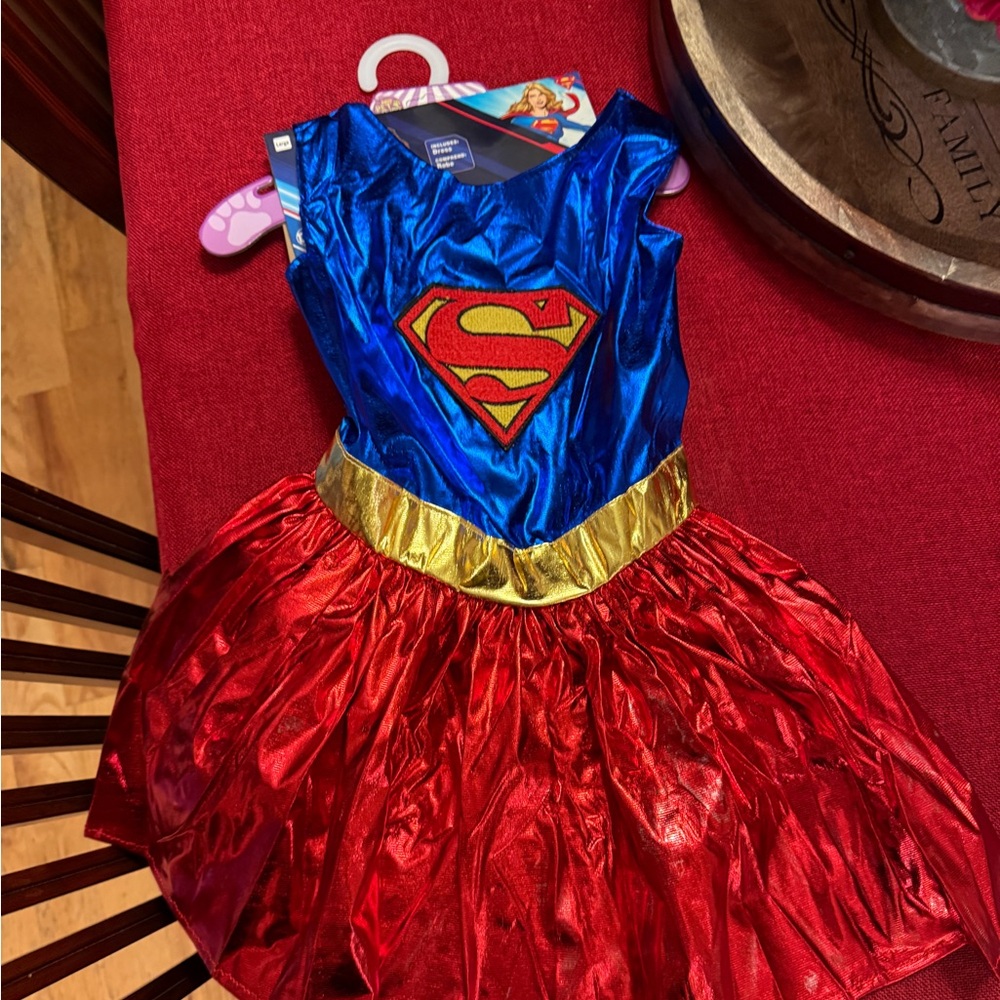 Pet supergirl costume.  Never worn.